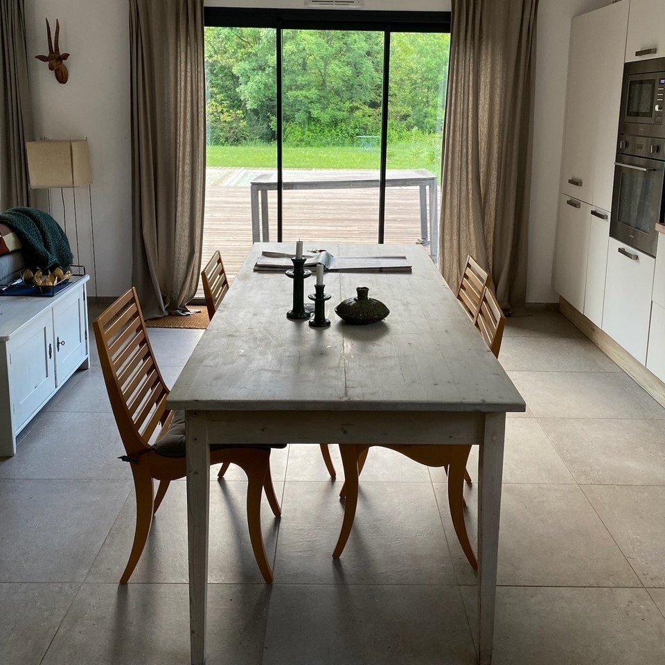Dining room table near kitchen
